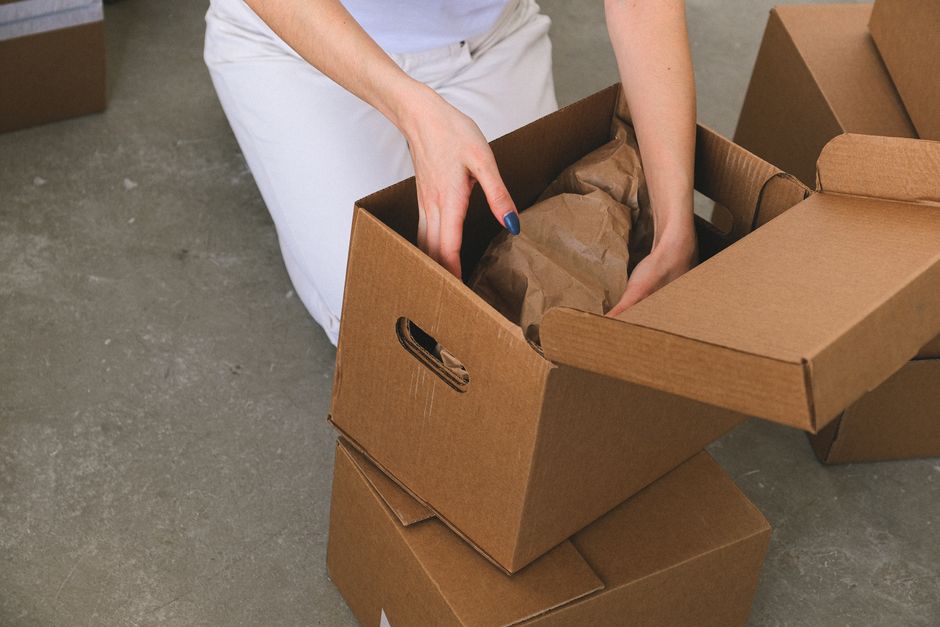 Professional packers boxing delicate items