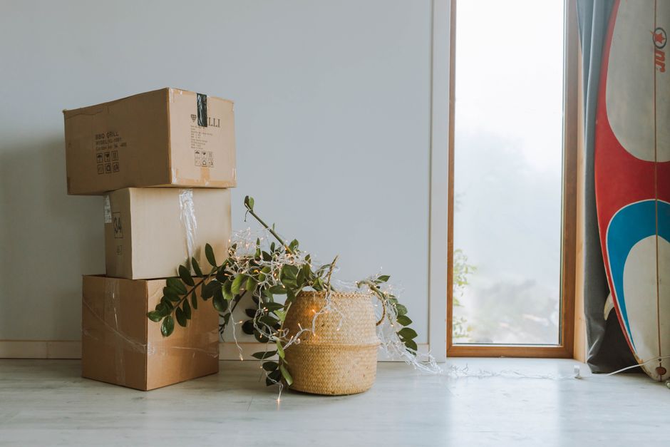 Unpacking boxes in a new living room